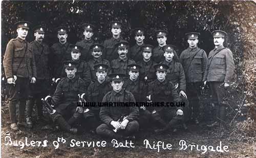 <p>It's late 1914 & Alf in the photo is second from the right in the second row from the back. In the card he writes to his yonger cousin Minnie that the weather has brightened up 